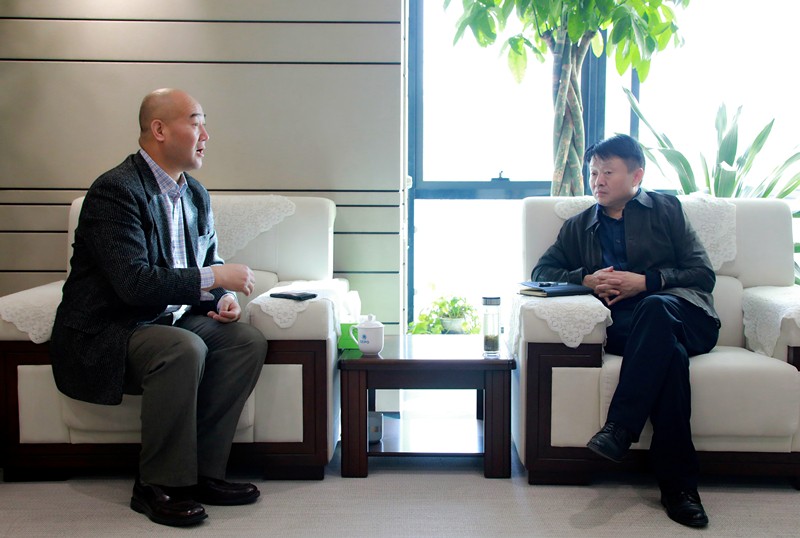 熊良虎会见华彩咨询公司董事长、总裁白万纲